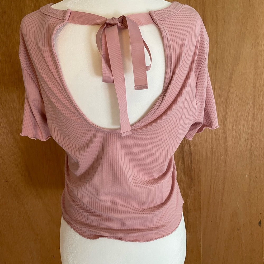 Blush top, tie and cut out back, size M